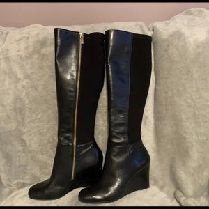 Beautiful Michael Kors Tall wedge black boots.